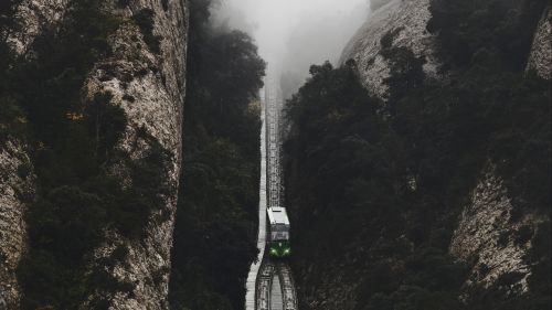 Aerial view of train on a fogy day HD Wallpaper