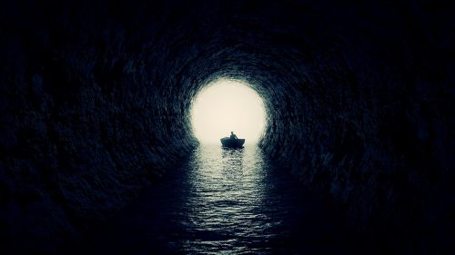 Boat inside the cave HD Wallpaper