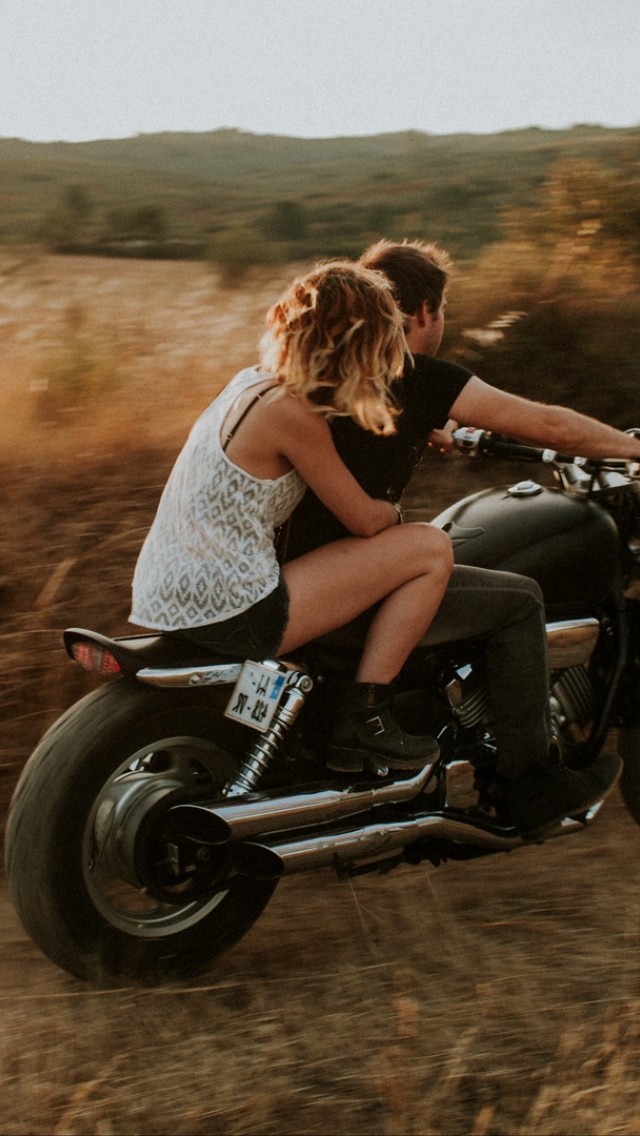 Couple on a motorcycle HD Wallpaper