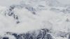 Foggy mountain peaks HD Wallpaper