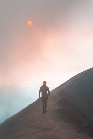 Man walking at the edge HD Wallpaper