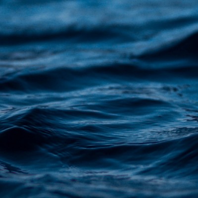 Wave ripples in blue water HD Wallpaper