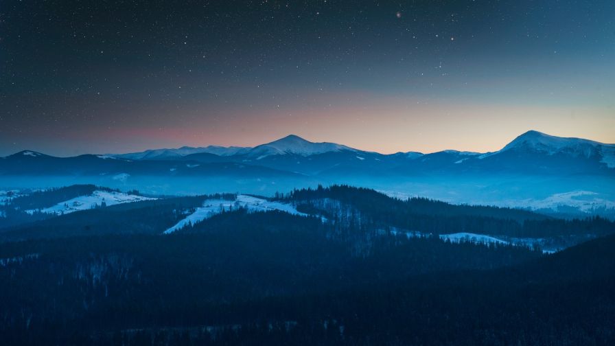 Aerial view of mountains on a starry night HD Wallpaper