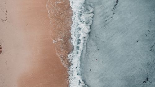 Aerial view of ocean waves HD Wallpaper