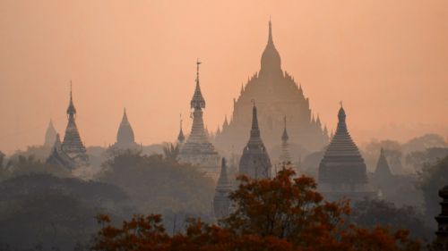 Asian temple in morning haze HD Wallpaper