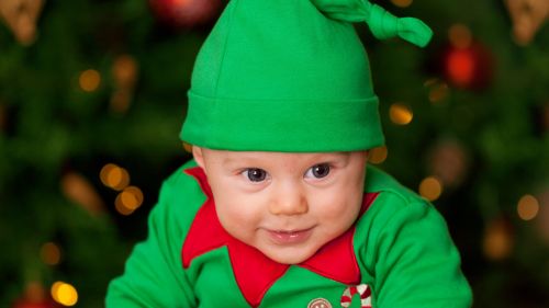 Baby Wearing Green Elf Costume HD Wallpaper