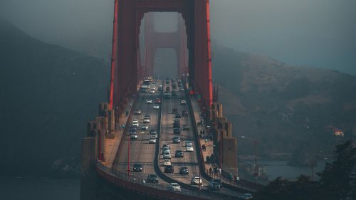 Bridge covered in fog HD Wallpaper