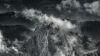 Clouds over a fogy mountain HD Wallpaper