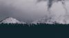 Clouds over snowy mountains HD Wallpaper
