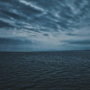 Dark clouds over the sea HD Wallpaper