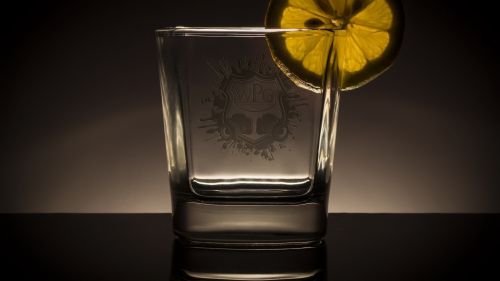 Empty glass with lemon HD Wallpaper