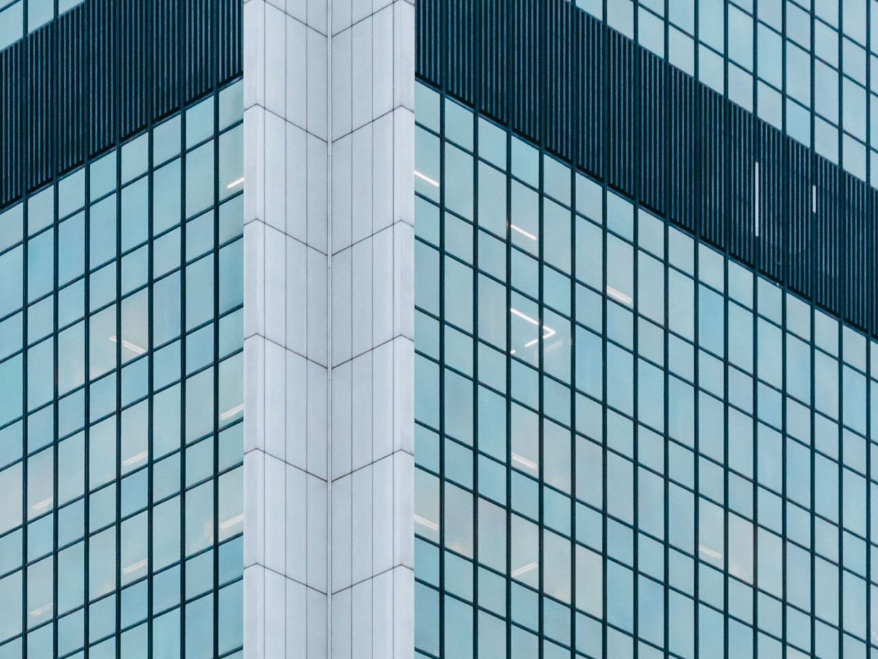 Facade of a glassy building HD Wallpaper