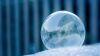 Glass Ball on White Surface HD Wallpaper