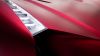 Headlights of red sports car HD Wallpaper