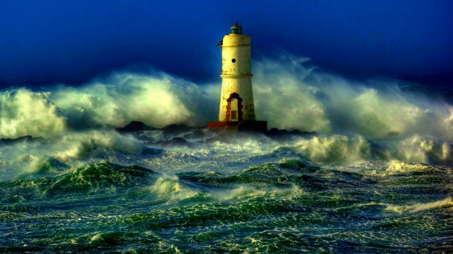 Lighthouse light during sea storm HD Wallpaper