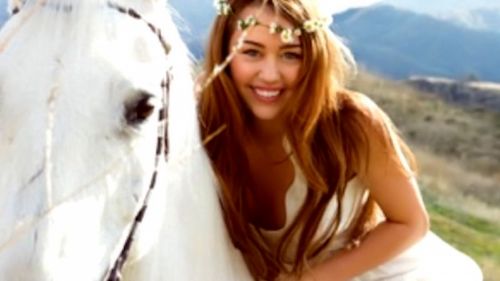 Miley cyrus and her horse HD Wallpaper