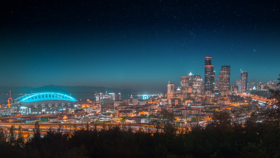 Panoramic view of city at night HD Wallpaper