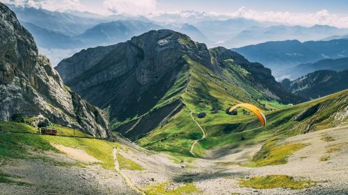 Paraglider in Mountains HD Wallpaper