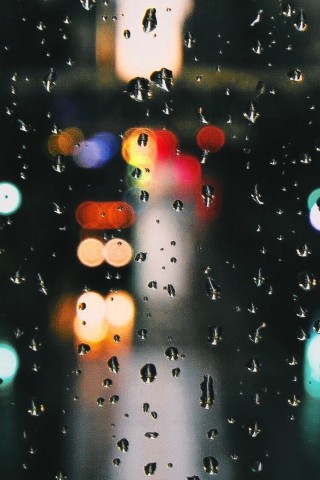 Rain drops at the window HD Wallpaper
