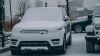 Range Rover covered in snow HD Wallpaper