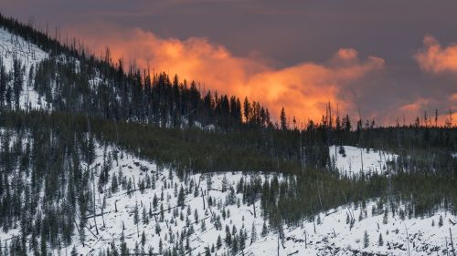 Sunset over a snowy mountain HD Wallpaper