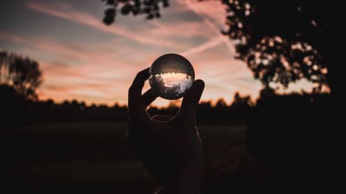 Sunset through a glass ball HD Wallpaper