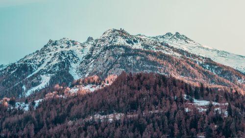 Village at a snowy mountain HD Wallpaper